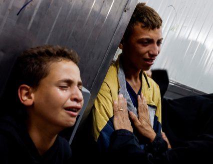 People mourn Palestinian children killed in Israeli strikes, in Khan Younis