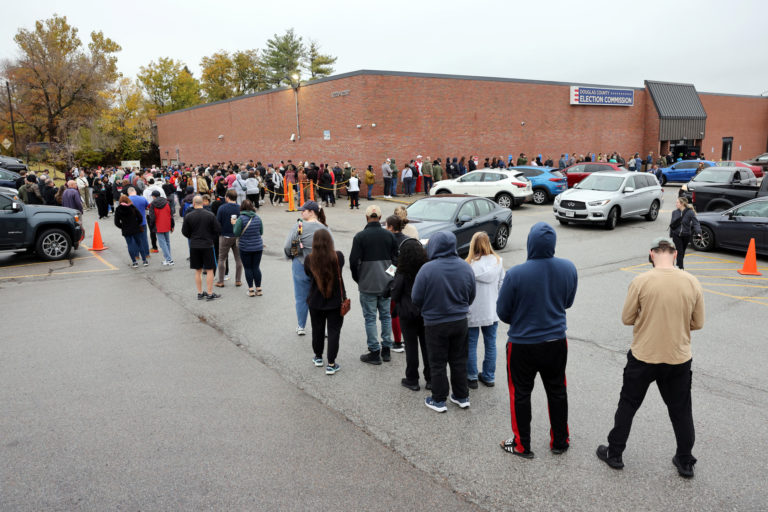 Voters cast absentee ballots before U.S. presidential election, in Omaha