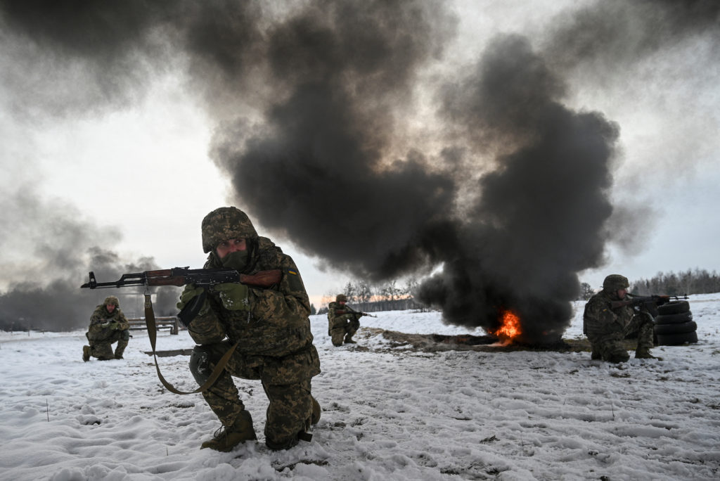 Ukrainian service members attend a military exercises in Chernihiv region