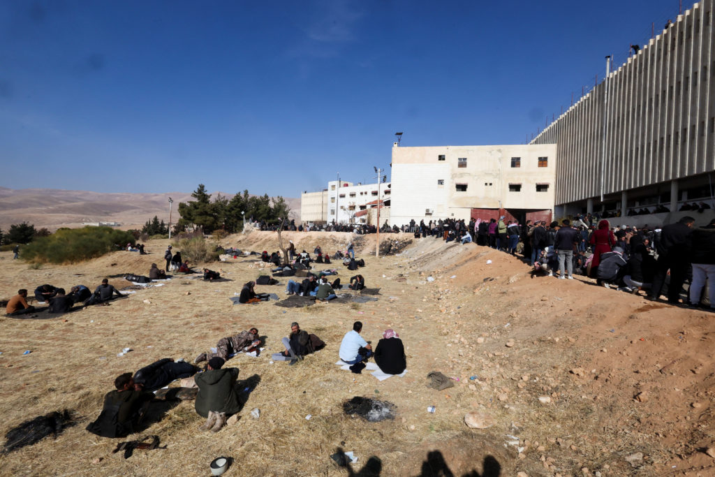 People search for prisoners at Sednaya prison