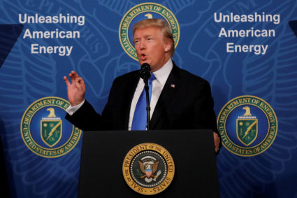 FILE PHOTO: U.S. President Donald Trump delivers remarks during an 'Unleashing American Energy' event at the Department of...