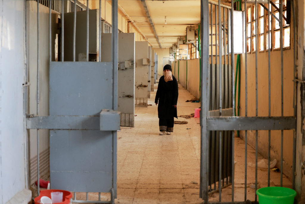 Hayat al-Turki searches Sednaya prison in the hope of finding her relatives