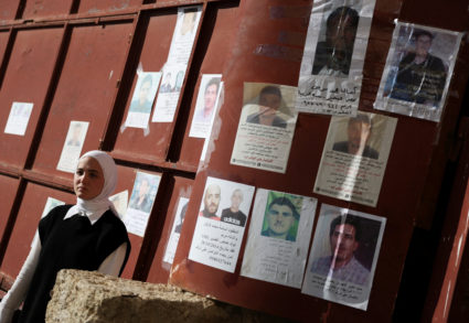 People search for prisoners at Sednaya prison