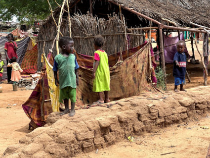 FILE PHOTO: Displaced Sudanese children stand at Zamzam camp in North Darfur