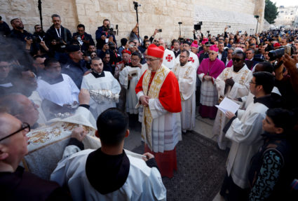 The Latin Patriarch of Jerusalem, Pierbattista Pizzaballa, leads a mass at the Church of Nativity in the Old City of Bethl...