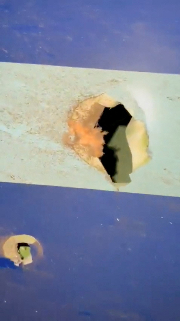 Damages in the wreckage of an Azerbaijan Airlines' Embraer passenger plane that crashed near Aktau