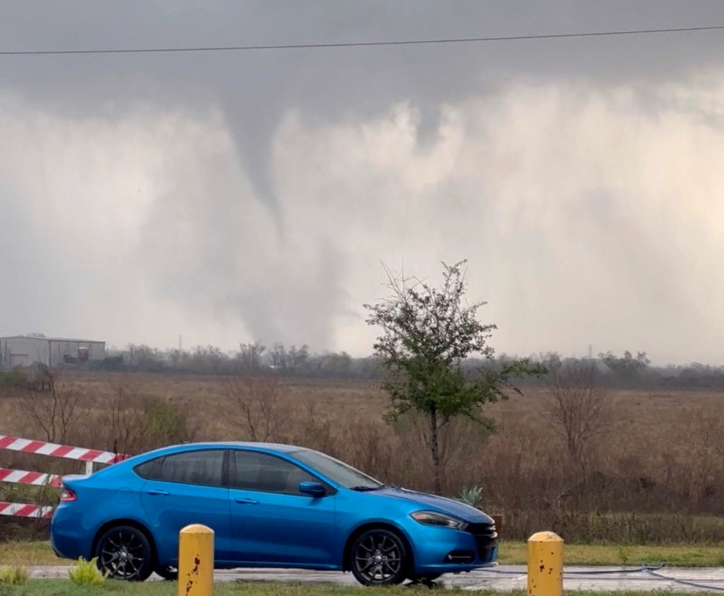 A tornado crosses a field in Katy, Texas