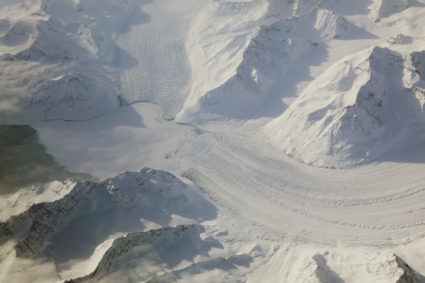 A glacial terminus is seen out the window of a NASA Gulfstream III flight to support the Oceans Melting Greenland (OMG) re...