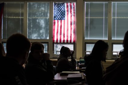classroom silhouettes american flag GettyImages-1181819032
