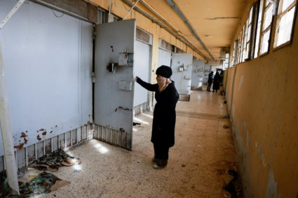 Hayat al-Turki searches Sednaya prison in the hope of finding her relatives