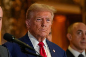 FILE PHOTO: Republican presidential nominee and former U.S. President Donald Trump looks on during a press conference at T...
