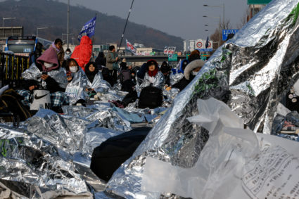 South Korean anti-corruption agency, police debate more forceful measures to detain impeached president