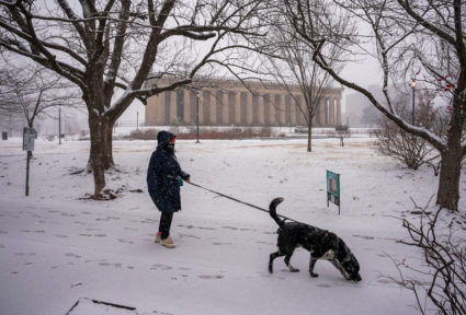 Winter storm plods into the Deep South, prompting states of emergency and school closures