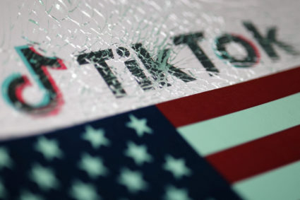 Illustration shows TikTok logo and U.S. flag