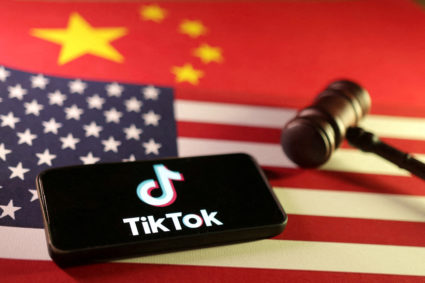 FILE PHOTO: Illustration shows U.S., Chinese flags, TikTok logo and gavel