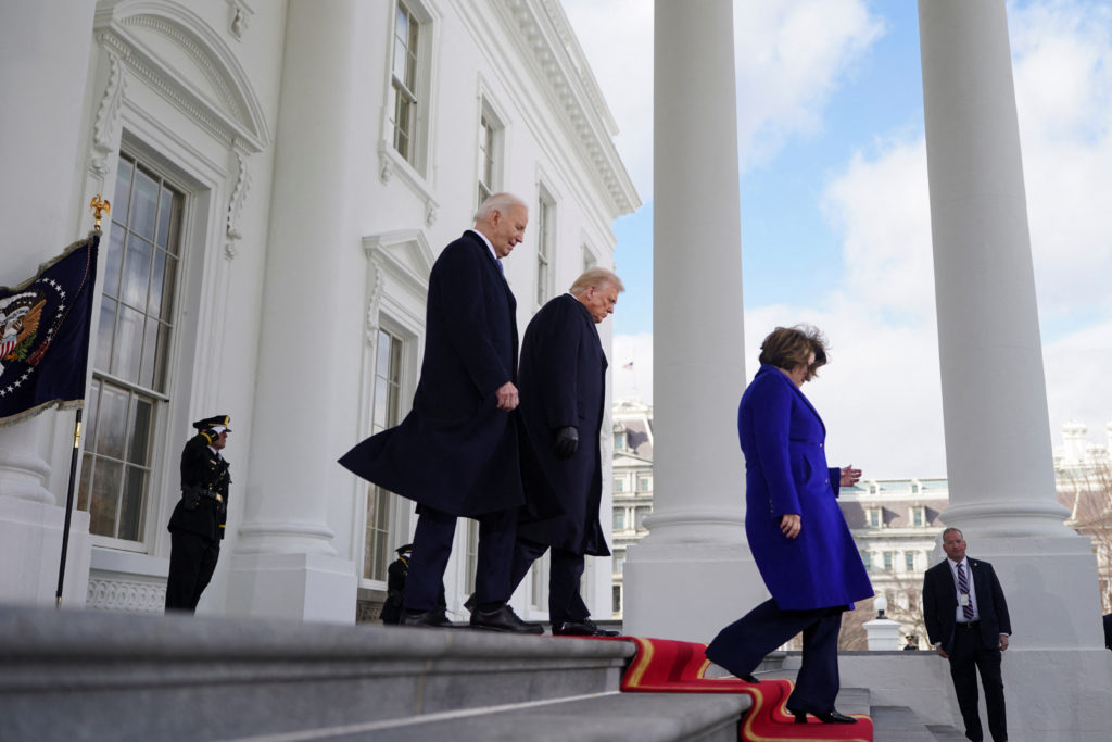 U.S. President-elect Donald Trump walks with U.S. President Joe Biden at the White House