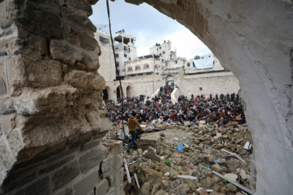 Palestinians attend the funeral of Rawhi Mushtaha and Sami Odeha, who were killed in an Israeli strike during the war, in ...