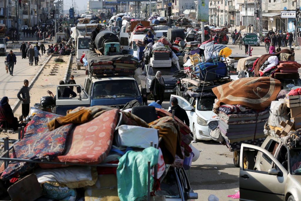 Displaced Palestinians wait to be allowed to return to their homes in northern Gaza, in the central Gaza Strip