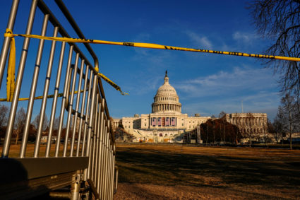 FILE PHOTO: The U.S. Capitol is seen while police tape remains in the foreground to keep the public off the property