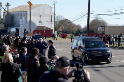 Former U.S. President Carter's casket travels to Atlanta, Georgia
