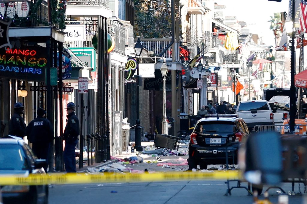 Debris is left along Bourbon Street after a pickup truck was driven into a large crowd in the French Quarter of New Orleans