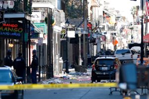 Debris is left along Bourbon Street after a pickup truck was driven into a large crowd in the French Quarter of New Orleans