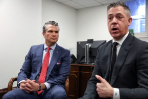 Defense secretary nominee Pete Hegseth meets with Senator-elect Jim Banks (R-IN) on Capitol Hill in Washington