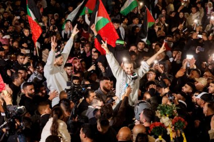 News Wrap: Hamas frees 8 hostages, Israel releases 100 prisoners in 3rd round of exchanges