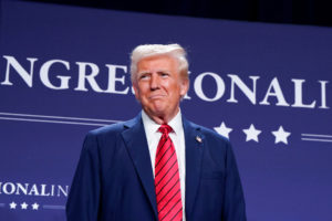 U.S. President Donald Trump attends a House Republican members conference meeting in Miami