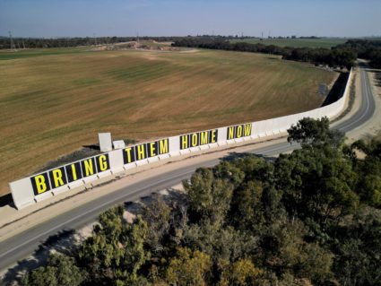FILE PHOTO: A drone view shows a message on a wall in support of hostages kidnapped during the deadly October 7, 2023 atta...