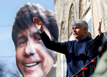 Rod Blagojevich waves to supporters outside his home after U.S. President Donald Trump commuted his prison sentence, in Ch...