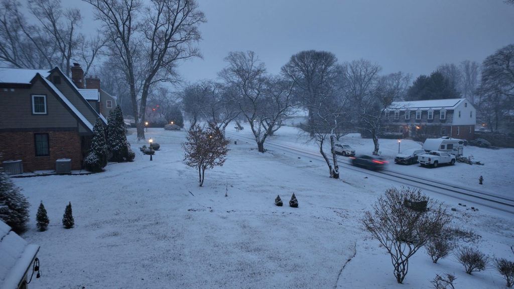 Drone view of snow-covered streets in Olney, Maryland