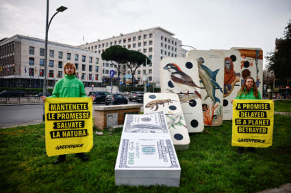 Greenpeace activists set up a protest outside Rome's headquarters of the Food and Agriculture Organization (FAO) of the Un...