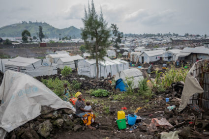FILE PHOTO: Displaced Congolese people prepare to leave camp as M23 rebels order evacuations near Goma