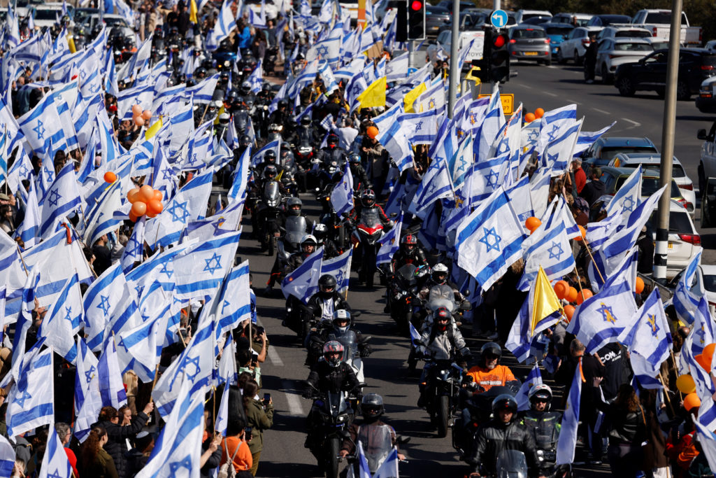Israelis gather to bid farewell to Shiri, Ariel and Kfir Bibas, in Ashkelon