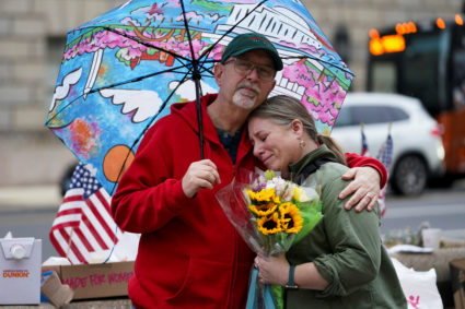 Former U.S. Agency for International Development (USAID) workers leave during a sendoff in Washington