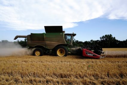 Farmer harvests winter wheat crop in Oklahoma
