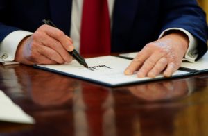 U.S. President Trump signs executive orders at the White House in Washington