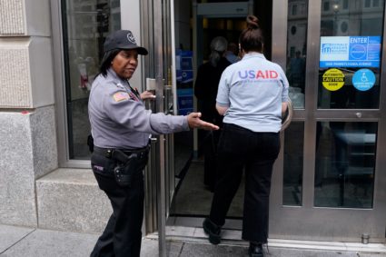 Former U.S. Agency for International Development (USAID) workers are applauded, during a sendoff in Washington
