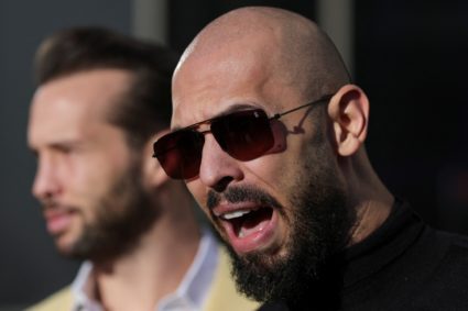 News Wrap: Tate brothers return to U.S. after travel ban lifted by prosecutors