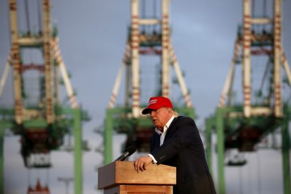 FILE PHOTO: U.S. Republican presidential candidate Donald Trump speaks on the USS Iowa in front of the Port of Los Angeles...