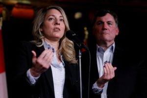 Canada's Minister of Foreign Affairs Melanie Joly, with Finance Minister Dominic LeBlanc, speaks to media during a Liberal...