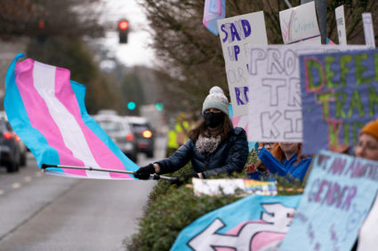 Demonstrators rally in support of trans youth at Seattle Children's hospital