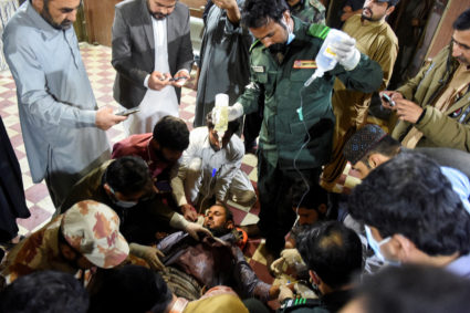 Pakistani officials say insurgent attack on train ended but some hostages are dead