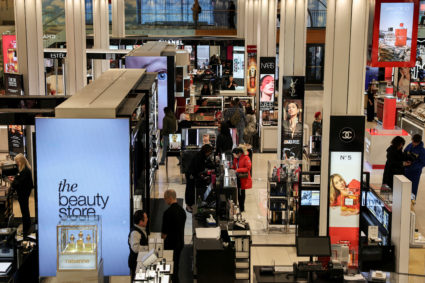 FILE PHOTO: People shop at Macy’s department store in Manhattan in New York City