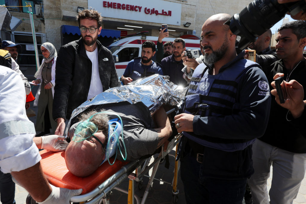 Foreign worker, who was wounded in an Israeli airstrike on a United Nations headquarters, according to Gaza's health minis...