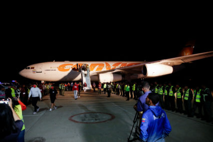 Venezuelan migrants arrive on a flight after being deported from the United States, in Caracas