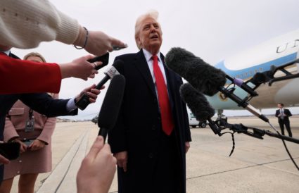 Trump speaks before boarding Air Force One as he departs for Florida
