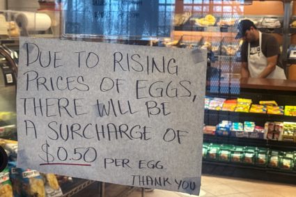 FILE PHOTO: A sign alerting customers of a price increase in eggs hangs inside a bagel store in the Queens borough of New ...