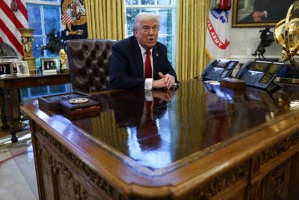 U.S. President Donald Trump speaks to the media in the Oval Office at the White House in Washington